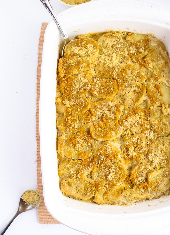 Make these easy vegan au gratin potatoes for your holiday table, and they definitely won't disappoint! My family loves them even more than the au gratin potatoes my mom used to make. :) #potatoes #vegan #dairyfree #glutenfree #veganrecipes // plantpowercouple.com