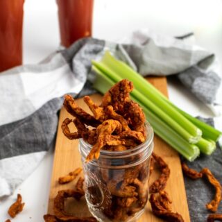 This meaty vegan jerky is made in the air fryer and full of that classic Bloody Mary cocktail flavor. The perfect snack to enjoy with a cold beer! #vegan #plantbased #jerky #recipe // plantpowercouple.com