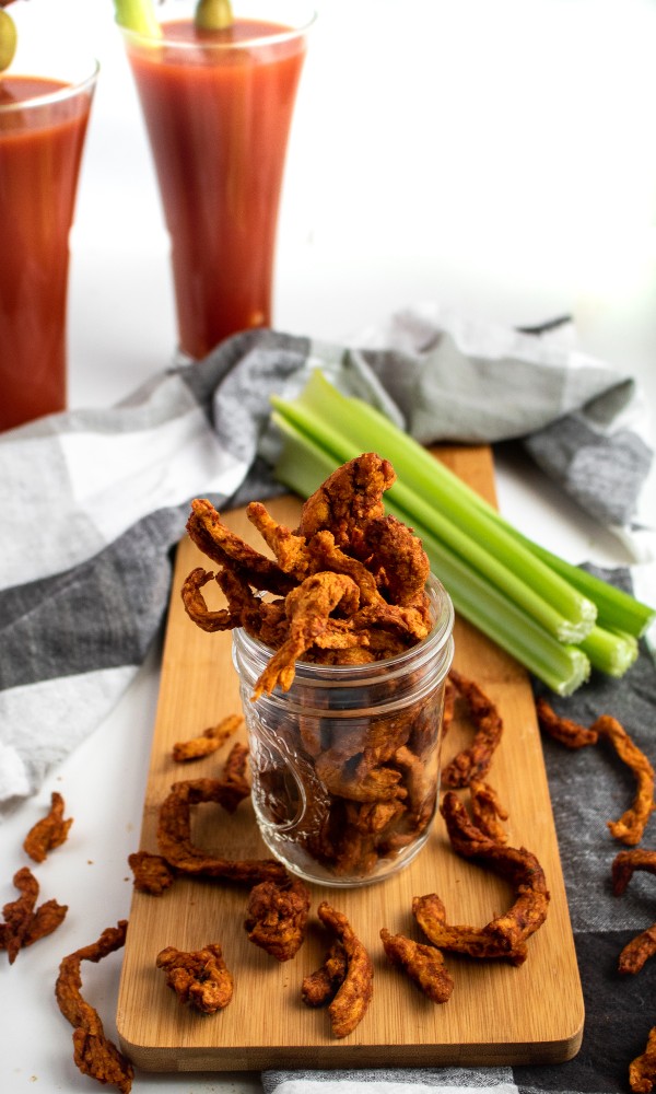 This meaty vegan jerky is made in the air fryer and full of that classic Bloody Mary cocktail flavor. The perfect snack to enjoy with a cold beer! #vegan #plantbased #jerky #recipe // plantpowercouple.com