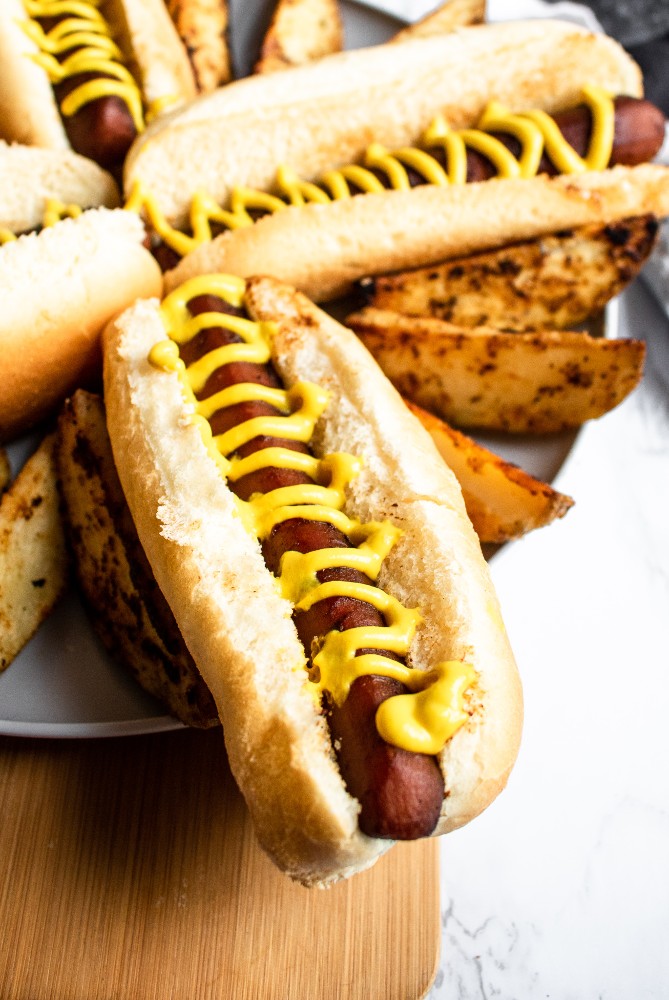 This is the BEST carrot dog recipe. It’s simple to make, and the marinade uses common pantry staples. Both the flavor and texture are so mind-blowing; you’ll be shocked you’re eating a carrot! #vegan #carrotdog #carrots #vegetarian #plantbased