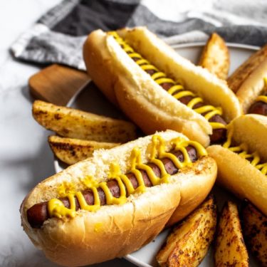 This is the BEST carrot dog recipe. It’s simple to make, and the marinade uses common pantry staples. Both the flavor and texture are so mind-blowing; you’ll be shocked you’re eating a carrot! #vegan #carrotdog #carrots #vegetarian #plantbased