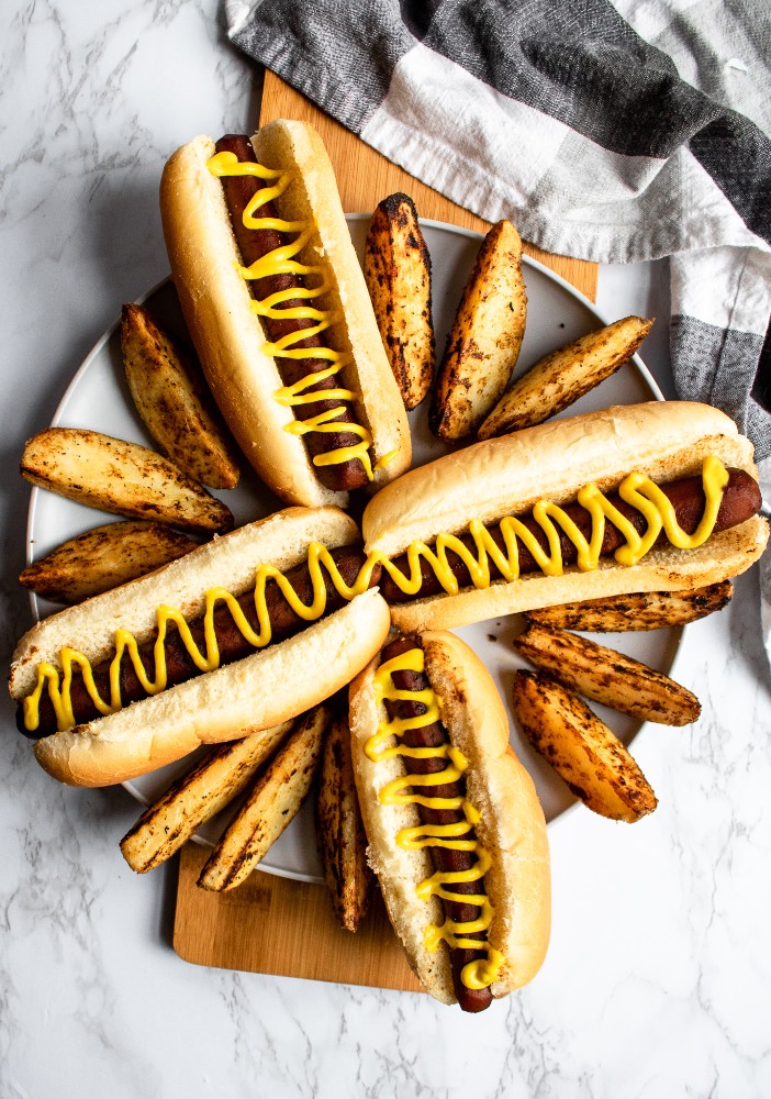 This is the BEST carrot dog recipe. It’s simple to make, and the marinade uses common pantry staples. Both the flavor and texture are so mind-blowing; you’ll be shocked you’re eating a carrot! #vegan #carrotdog #carrots #vegetarian #plantbased
