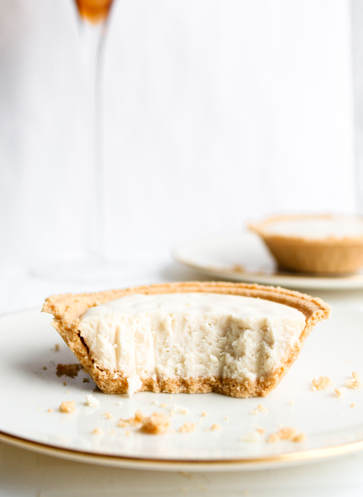 This easy vegan champagne cheesecake recipe is the perfect way to celebrate! Made with 7 simple ingredients, these tofu-based desserts combine the classic flavor of cheesecake with the celebratory spirit of champagne so perfectly I could cry! #vegan #cheesecake #dairyfree #tofu // plantpowercouple.com