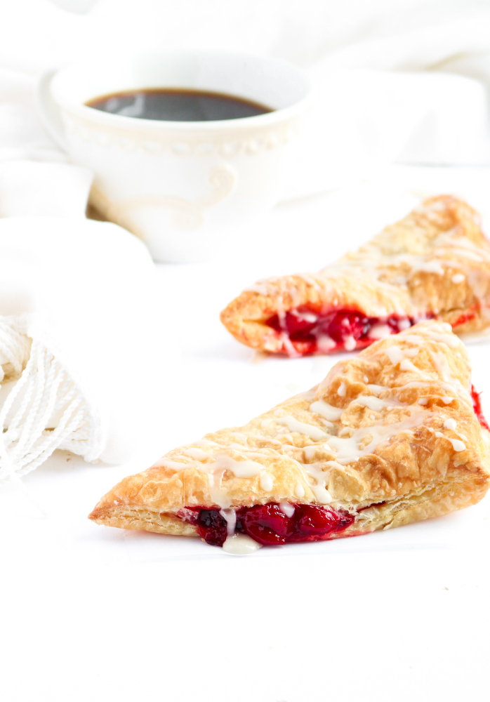 These vegan cherry turnovers are so sinfully simple and devilishly delicious! With just two ingredients, even the most beginner of cooks can have these gorgeous bakery-style beauties done and ready to eat - for breakfast OR dessert - in just under an hour. ﻿#vegan #breakfast #turnover #cherries // plantpowercouple.com