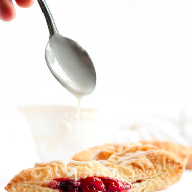These vegan cherry turnovers are so sinfully simple and devilishly delicious! With just two ingredients, even the most beginner of cooks can have these gorgeous bakery-style beauties done and ready to eat - for breakfast OR dessert - in just under an hour. ﻿#vegan #breakfast #turnover #cherries // plantpowercouple.com