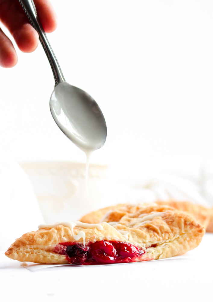 These vegan cherry turnovers are so sinfully simple and devilishly delicious! With just two ingredients, even the most beginner of cooks can have these gorgeous bakery-style beauties done and ready to eat - for breakfast OR dessert - in just under an hour. ﻿#vegan #breakfast #turnover #cherries // plantpowercouple.com
