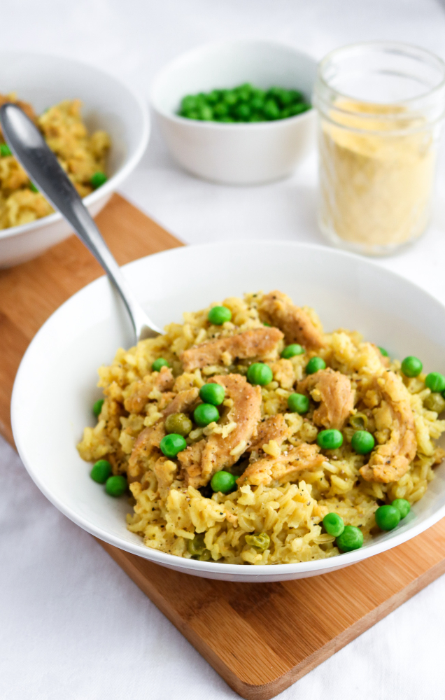 This easy slow cooker vegan chicken and rice is classic comfort food made vegan! Great for a busy weeknight or meal prep session, it's also healthy, gluten-free, and can easily be made oil-free. #vegan #crockpot #slowcooker #rice #soycurls // plantpowercouple.com