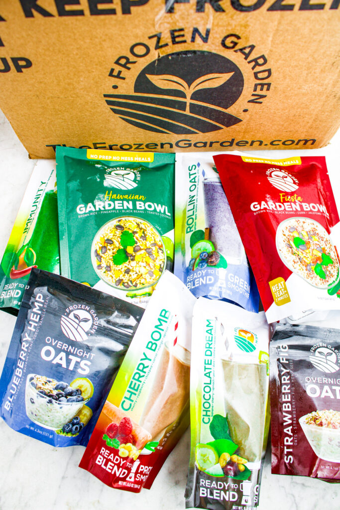 Overhead photo of a pile of Frozen Garden products next to a Frozen Garden box