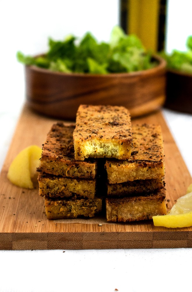 Lemon Pepper Tofu Cutlets are the perfect meal prep staple! Slice ‘em up for salads, use them for sandwiches, or serve ‘em over a mountain of rice for a filling and easy vegan dinner! #vegan #tofu #veganrecipe #plantbased #mealprep // plantpowercouple.com