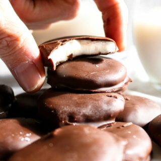 Homemade Vegan Peppermint Patties made with Baileys Almande - an easy no-bake treat that's beyond perfect for the holidays, summer, St Patrick's Day, Valentine's Day, or really ANY time! // plantpowercouple.com #vegan #dessert #recipe #chocolate #baileys