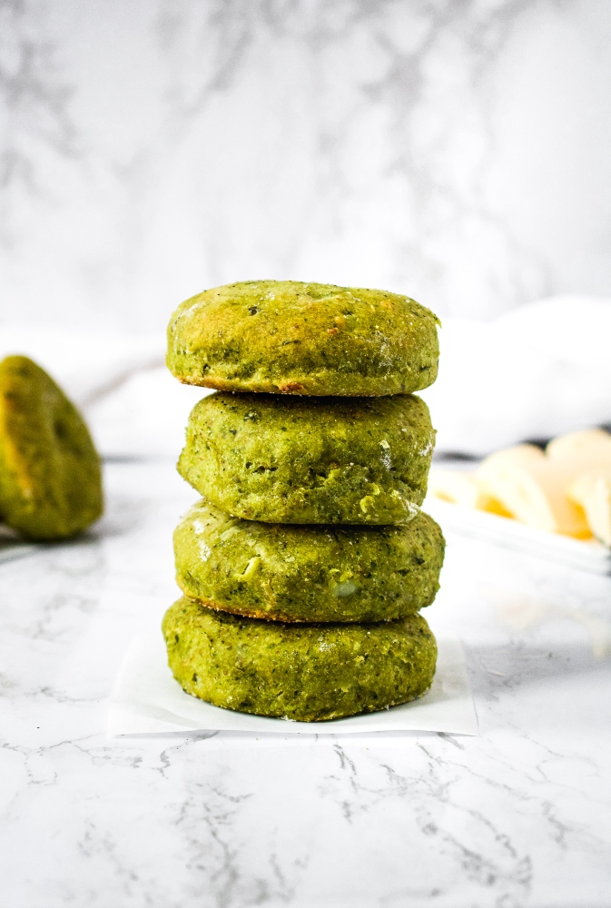 These Vegan Pesto Potato Biscuits are soft, fluffy, and flavor-packed. Yeast-free biscuits are so easy to make and taste great served as a plant-based breakfast with a slather of vegan butter, smothered in dairy-free gravy, alongside a big salad for lunch, or eaten straight out of the oven! It’s a great recipe to use up leftover mashed potatoes in the winter and basil from your garden hauls in the summer. You only need 8 ingredients and 45 minutes to make amazing homemade pesto biscuits!