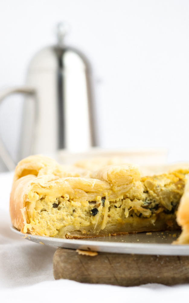 I’m about to rock your world with this delicious, decadent, and undeniably simple vegan quiche. It's made with a perfectly seasoned tofu base and encased in the most heavenly puff pastry crust. Welcome to savory brunch heaven! #vegan #quiche #veganrecipe #tofu #plantbased // plantpowercouple.com