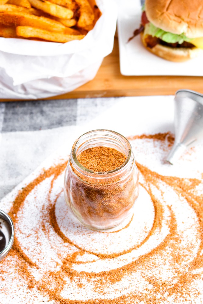 This Copycat Red Robin Seasoning is a heavenly seasoned salt that's incredible on everything from fried or roasted potatoes to veggie burgers + tacos. #vegan #seasoning #salt #paprika #recipe