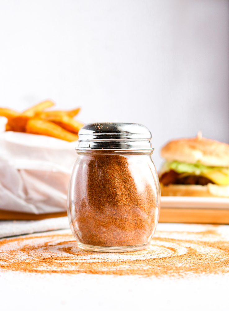This Copycat Red Robin Seasoning is a heavenly seasoned salt that's incredible on everything from fried or roasted potatoes to veggie burgers + tacos. #vegan #seasoning #salt #paprika #recipe // plantpowercouple.com