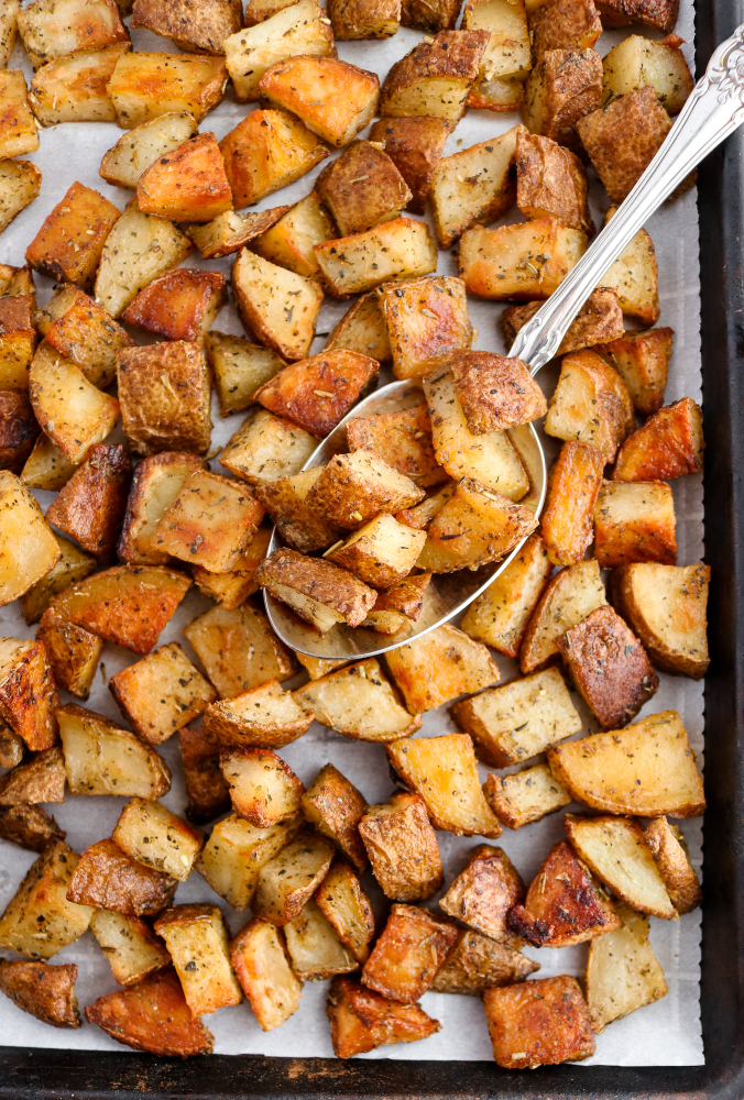 Every good cook needs a solid roasted potato recipe in their arsenal, and this is ours! It's made with only six simple ingredients and comes out perfectly crispy + flavorful every. single. time. #vegan #potatoes #veganrecipes #glutenfree #plantbased // plantpowercouple.com