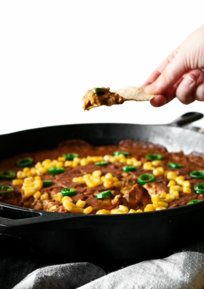 This hot walnut sausage dip may not be the prettiest appetizer on the table, but you'll forget all that the minute you take a bite. So much flavor, a rich, stick-to-your-ribs texture, and easy to make #vegan #appetizer! // plantpowercouple.com