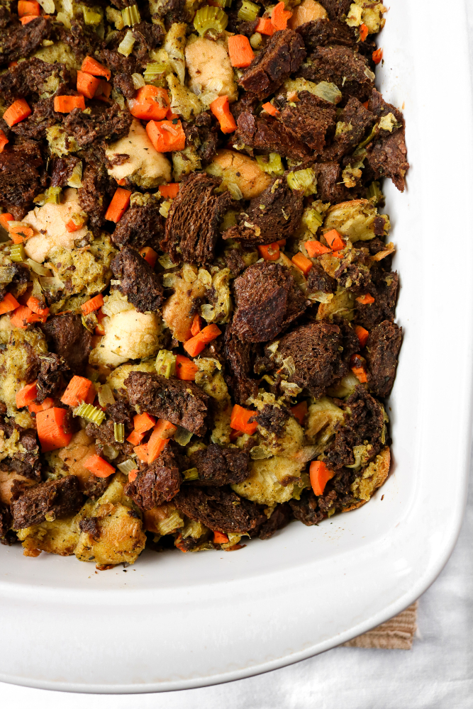 This vegetarian Thanksgiving stuffing is an amazing plant-based side dish for your holiday table. It’s easy to make with simple ingredients. The texture of this vegan stuffing is warm and bready on the inside and slightly crispy on top. The flavors will take you back to childhood!