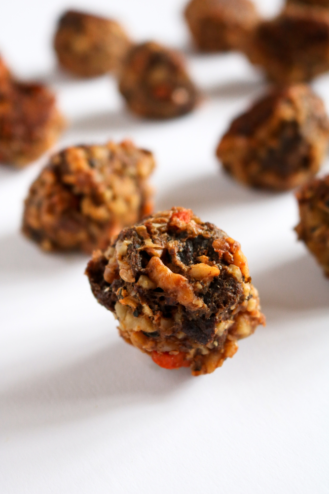 These vegan walnut sausage and stuffing balls are a great way to use up leftover stuffing and a perfect holiday appetizer! They're so full of flavor! // #vegan #appetizer #thanksgiving #stuffing #vegetarian plantpowercouple.com