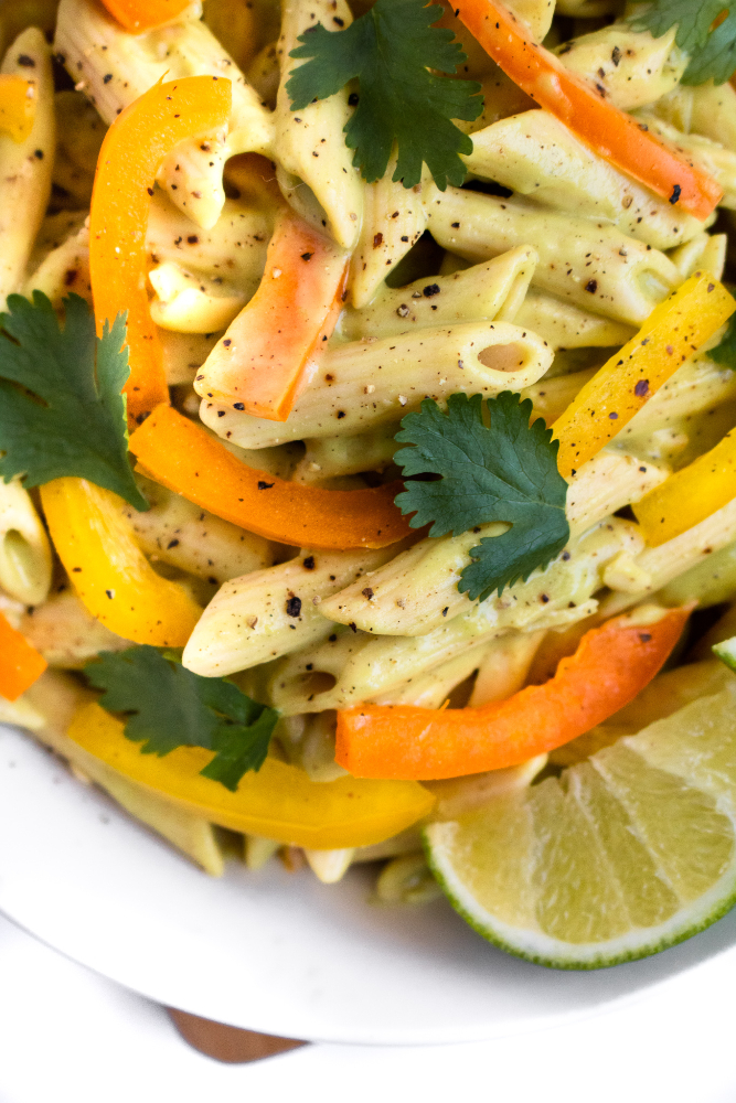 Vegan Tequila Lime Pasta recipe is going to be your favorite summer dinner! It’s easy to make, healthy, and FULL of fun summer flavor. Serve it cold as a side at all your outdoor BBQs or hot as a main dish with some grilled summer veg. #vegan #dinner #pasta #glutenfree // plantpowercouple.com