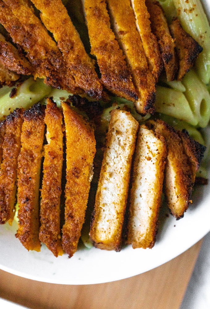 These Tequila Lime Tofu Cutlets are perfect for tofu tacos, quesadillas, or Mexican-inspired dinner bowls and salads! They are easy to make with a quick tequila-infused chili lime marinade, and slow-baked until they are crispy on the outside and meaty on the inside! You’ll love to add this tofu recipe for your weekly meal prep. Oh and they are freezer-friendly too!