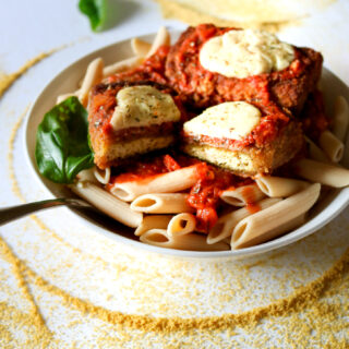 The BEST vegan chicken parmesan we've ever tasted! You won't believe these cutlets are made with tofu after you're done with them, and that peppery breading really knocks it outta the park. Gluten-free option, and the cutlets are freezer-friendly! // plantpowercouple.com