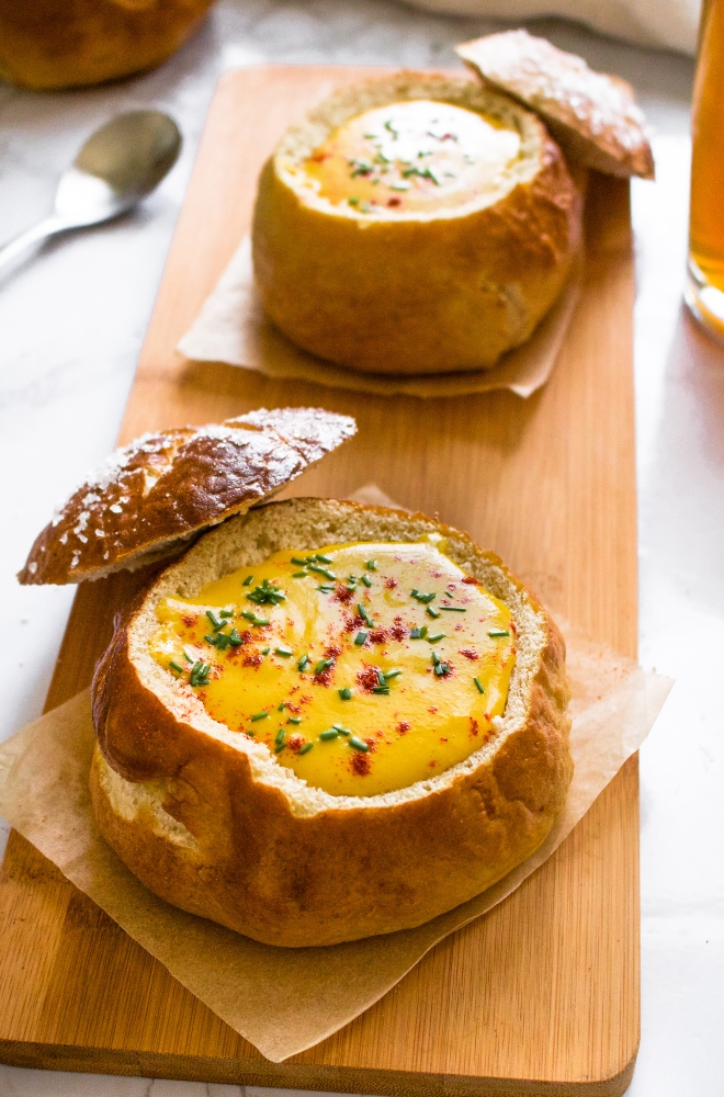 This cozy vegan beer cheese soup is nut-free and tastes like actual beer cheese soup, not just a healthy version of it! Surprisingly though, this cozy soup is dairy-free, easy to make gluten-free, and includes an oil-free option along with some sneaky hidden veggies. Make it for your Oktoberfest feast at home with ALL the German beers! #vegansoup #vegancheese #veganbeercheese #plantbased #veganrecipe #easyveganrecipe