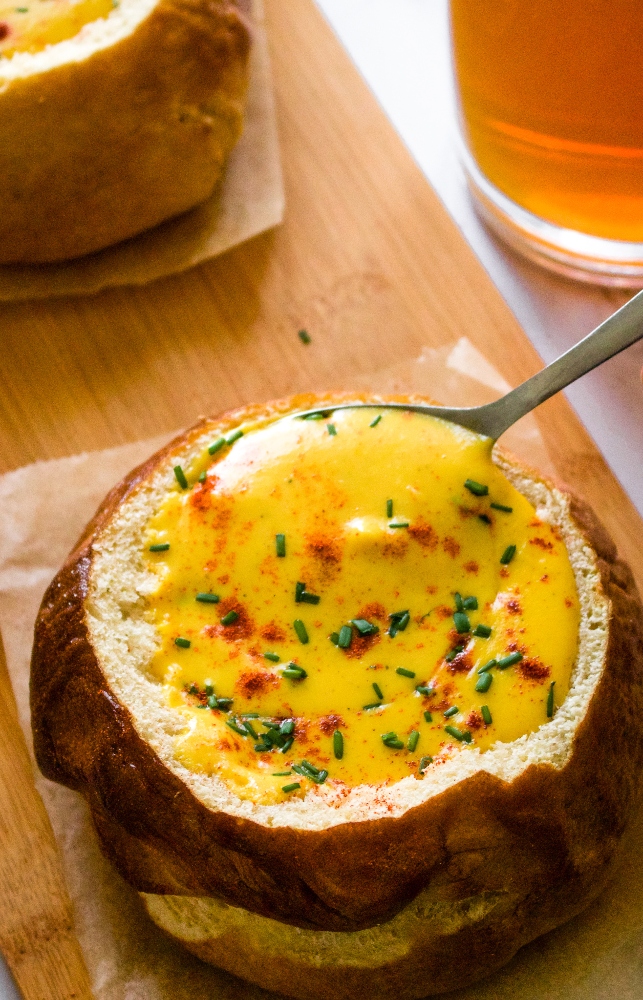 This cozy vegan beer cheese soup is nut-free and tastes like actual beer cheese soup, not just a healthy version of it! Surprisingly though, this cozy soup is dairy-free, easy to make gluten-free, and includes an oil-free option along with some sneaky hidden veggies. Make it for your Oktoberfest feast at home with ALL the German beers! #vegansoup #vegancheese #veganbeercheese #plantbased #veganrecipe #easyveganrecipe