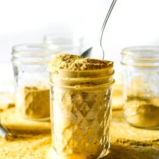 Make your own vegan chicken-style bouillon powder with 7 ingredients, 1 food processor, and less than 10 minutes. Use it to make THE most flavorful chicken-free broth for soups, stews, seitan + tofu marinades, etc. #vegan #veganchicken #veganrecipe #easyveganrecipe #nutritionalyeast #turmeric #plantbased #plantpowercouple // plantpowercouple.com