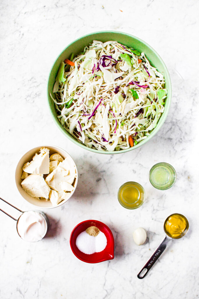 Overhead photo of all the ingredients you need to make our healthy coleslaw recipe