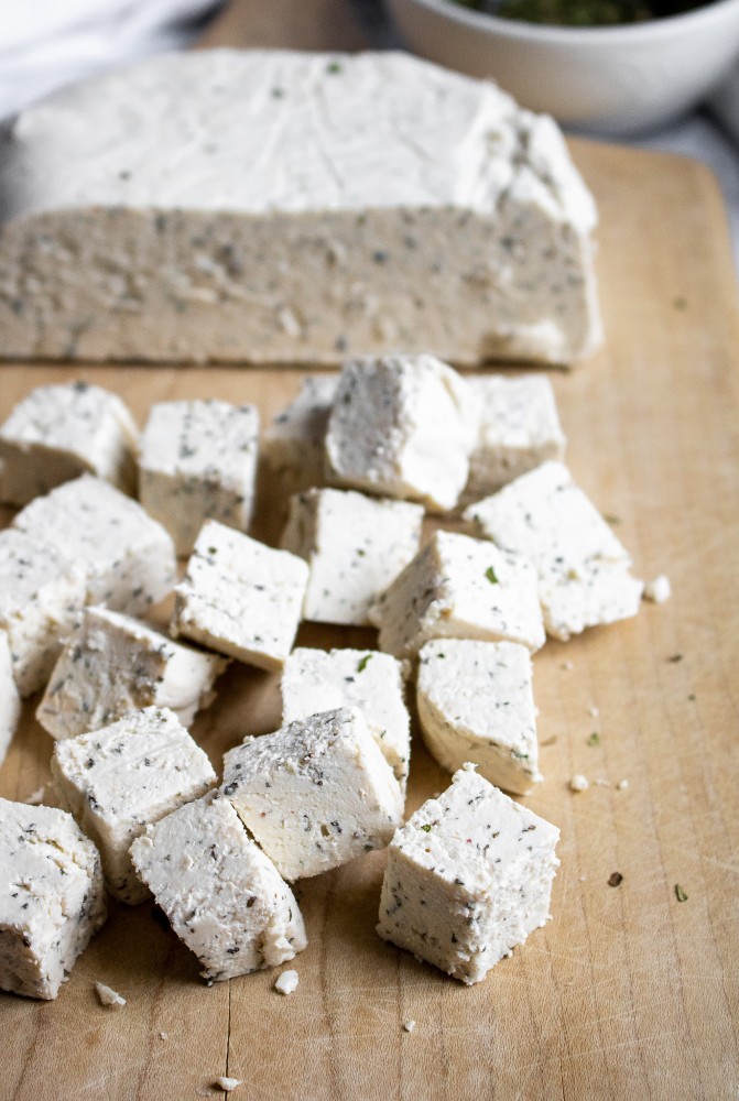 The most awesome vegan feta cheese! It’s slice-able, crumbly, easy to make, and flavorful’. Great for salads, snack plates, pitas, and pastas! #vegan #vegancheese #veganfeta #tofu #dairyfree #plantbased