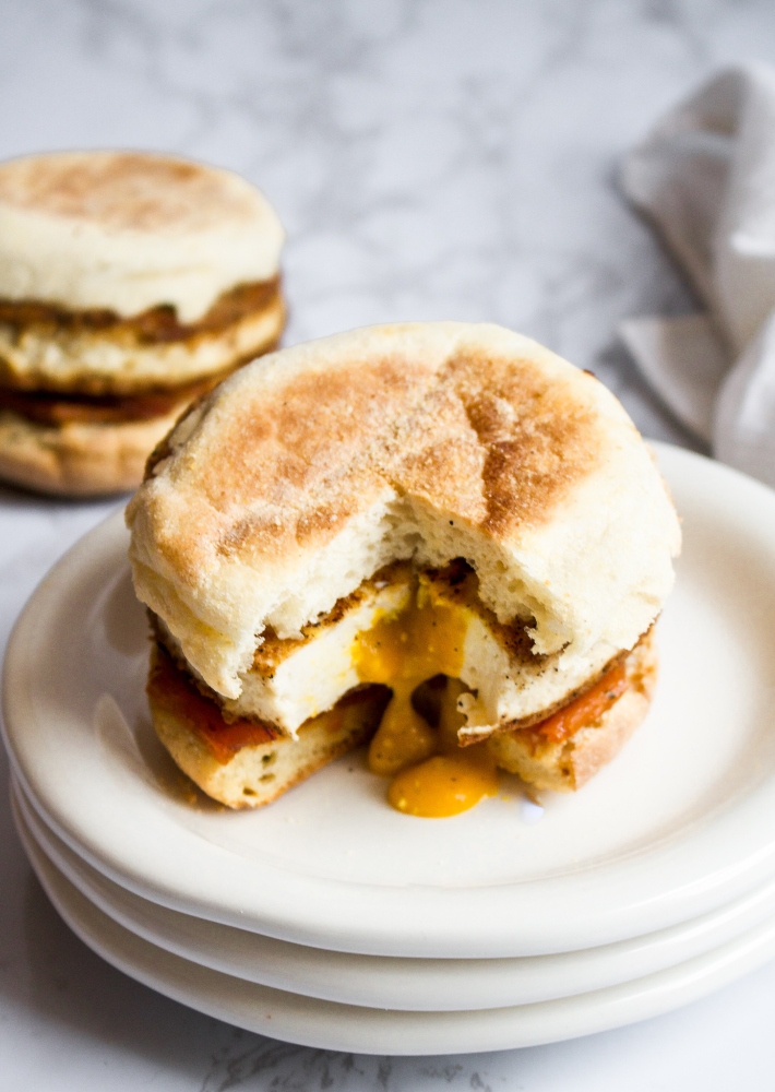 This vegan fried egg is such a fun and delicious recipe. It has a goopy vegan yolk sauce that drips out of the egg when you bite into it - just perfect for toast dipping or a messy fried egg breakfast sandwich. #tofu #veganegg #veganeggyolk #veganfriedegg #veganbreakfast #veganbreakfastsandwich #tofuegg #tofufriedegg #veganbrunch #comfortfood