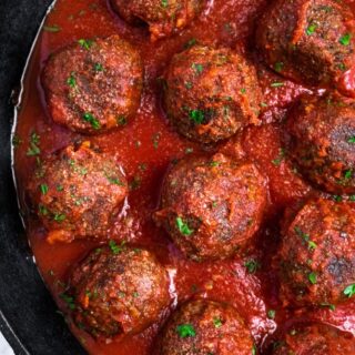 The BEST Vegan Meatballs made with TVP. They're SUPER meaty, full of spicy Italian flavor, and NOT mushy - our #vegan #meatball dreams come true! #vegetarian #veganmeatballs #plantbased #plantpowercouple // plantpowercouple.com