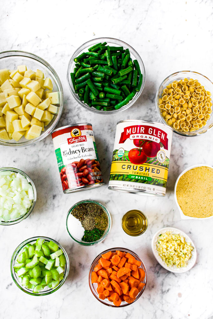 Overhead photo of all the ingredients needed to make vegan minestrone soup