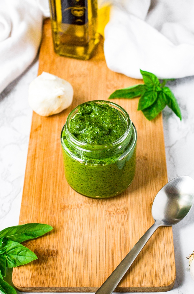 This vegan pesto recipe is easy to make with flavorful ingredients like cashews, nutritional yeast, and miso paste for a cheesy fermented taste. This plant-based pesto is perfect for vegan pesto pasta, a pesto pizza, and served as a dip or spread on a dairy-free snack board. It can be made with spinach, basil, or a combination of the two which makes this the perfect recipe for any time of year. You’ll be shocked how easy it is to make your own homemade pesto!