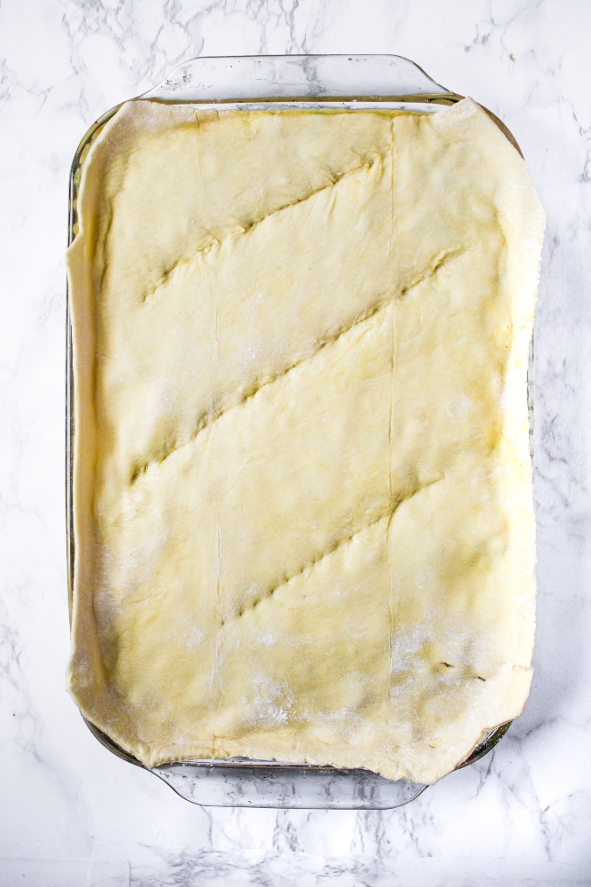 This vegan pot pie casserole is a quick and deliciously dairy-free and vegetarian version of the savory chicken pie I fell in love with in London. It’s made with tremendously simple and easily found ingredients like store-bought puff pastry and frozen mixed vegetables. The hardest part of this vegan chicken pot pie recipe is waiting for it to finish cooking!