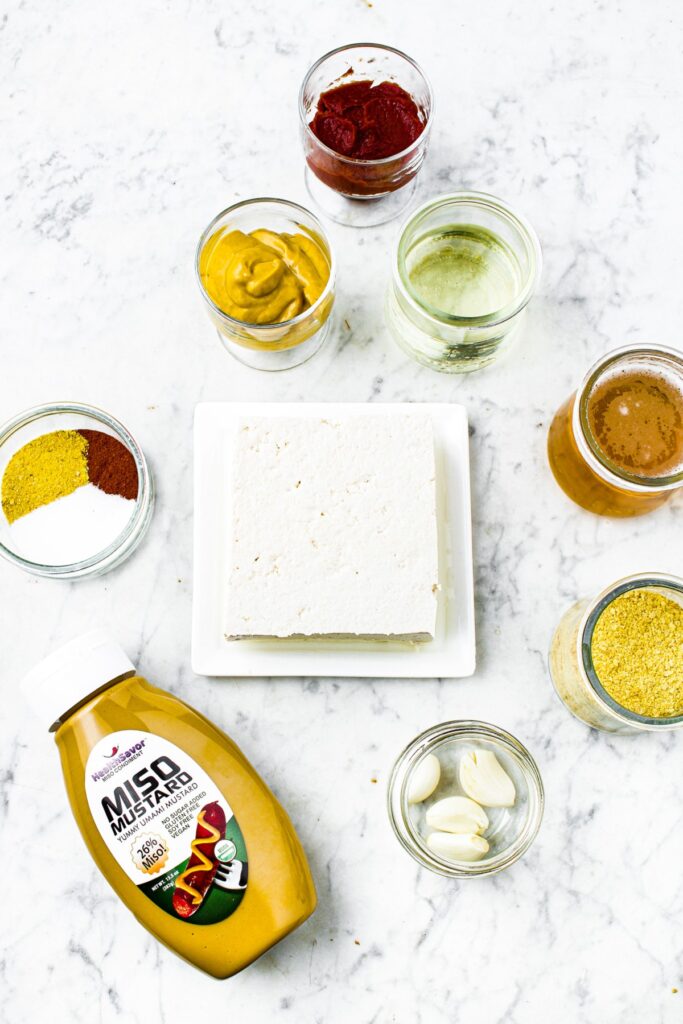 Overhead shot of all the ingredients you need to make tofu beer cheese dip