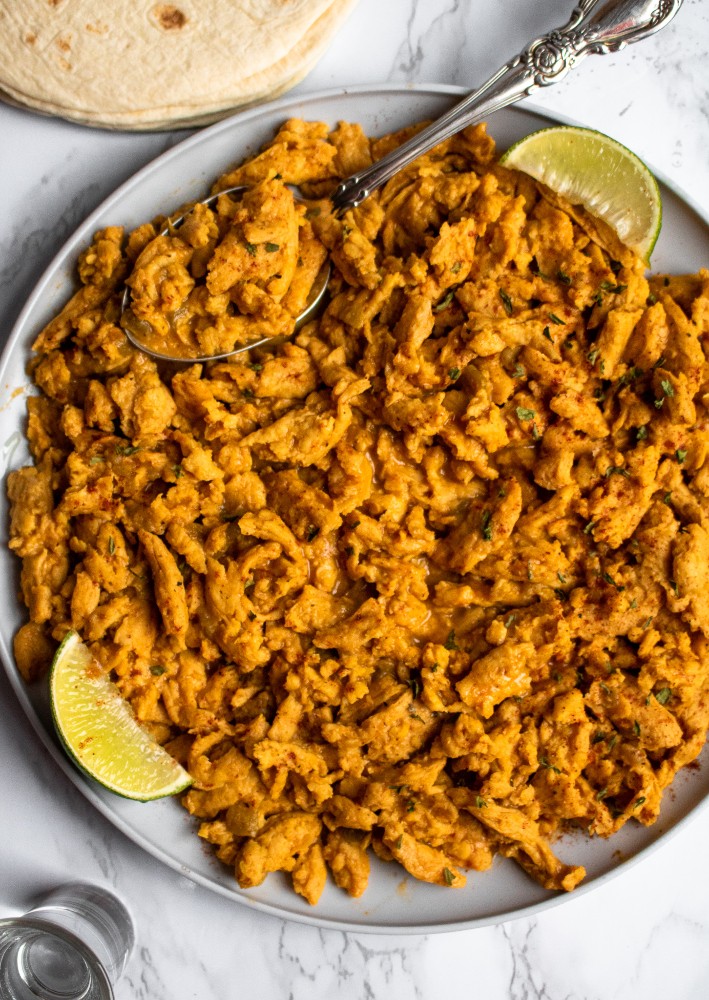 This 8-ingredient vegan taco meat is easy to make and delicious! It’s tender, juicy, and full of zesty Mexican-inspired flavor. No one will know it’s #vegan! #tacotuesday #plantbased #oilfree #glutenfree #plantpowercouple // plantpowercouple.com
