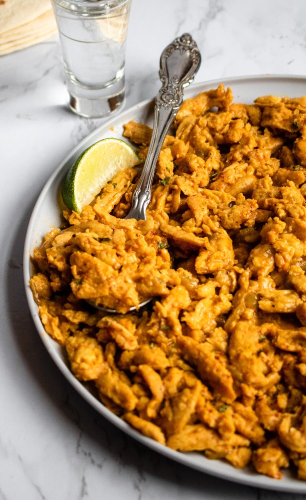 This 8-ingredient vegan taco meat is easy to make and delicious! It’s tender, juicy, and full of zesty Mexican-inspired flavor. No one will know it’s #vegan! #tacotuesday #plantbased #oilfree #glutenfree #plantpowercouple // plantpowercouple.com